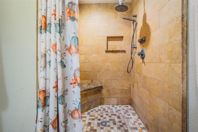 Welcome to this beautifully maintained 3-bedroom, 2-bathroom on Oak Hills Country Club in Florida - for sale on GolfHomes.com, golf home, golf lot