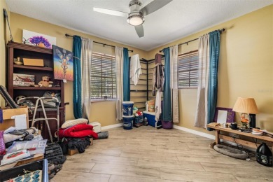 Welcome to this beautifully maintained 3-bedroom, 2-bathroom on Oak Hills Country Club in Florida - for sale on GolfHomes.com, golf home, golf lot