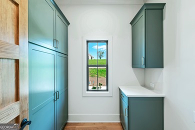 Built by TS Family Homes, this 4BR / 3BA, 3,158-square-foot on Old Union Golf Course in Georgia - for sale on GolfHomes.com, golf home, golf lot