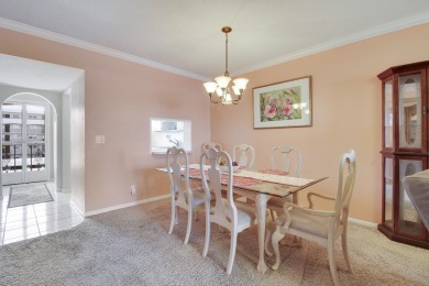 ALL ASSESSMENTS PAID IN FULL.  NEW IMPACT WINDOWS THROUGHOUT on North Palm Beach Country Club in Florida - for sale on GolfHomes.com, golf home, golf lot