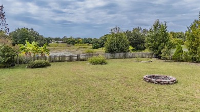Welcome to this beautifully maintained 3-bedroom, 2-bathroom on Oak Hills Country Club in Florida - for sale on GolfHomes.com, golf home, golf lot