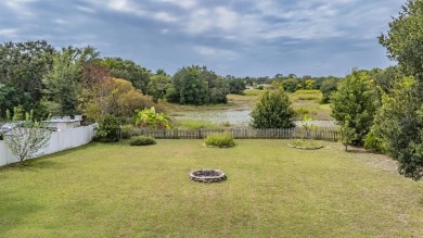 Welcome to this beautifully maintained 3-bedroom, 2-bathroom on Oak Hills Country Club in Florida - for sale on GolfHomes.com, golf home, golf lot