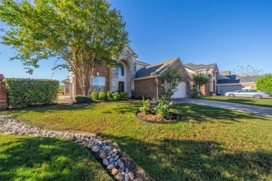 This stunning two-story home is located in the highly on Mansfield National Golf Club in Texas - for sale on GolfHomes.com, golf home, golf lot