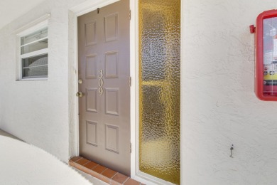 ALL ASSESSMENTS PAID IN FULL.  NEW IMPACT WINDOWS THROUGHOUT on North Palm Beach Country Club in Florida - for sale on GolfHomes.com, golf home, golf lot