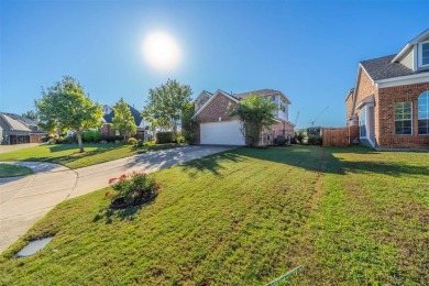 This stunning two-story home is located in the highly on Mansfield National Golf Club in Texas - for sale on GolfHomes.com, golf home, golf lot