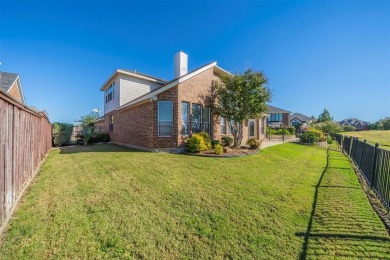 This stunning two-story home is located in the highly on Mansfield National Golf Club in Texas - for sale on GolfHomes.com, golf home, golf lot