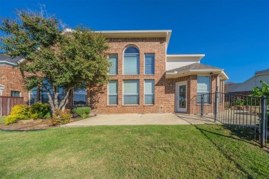 This stunning two-story home is located in the highly on Mansfield National Golf Club in Texas - for sale on GolfHomes.com, golf home, golf lot