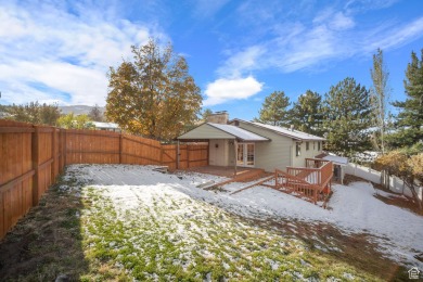 Beautiful east bench home with views galore.  Five spacious on  in Utah - for sale on GolfHomes.com, golf home, golf lot