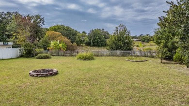 Welcome to this beautifully maintained 3-bedroom, 2-bathroom on Oak Hills Country Club in Florida - for sale on GolfHomes.com, golf home, golf lot
