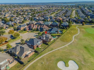 This stunning two-story home is located in the highly on Mansfield National Golf Club in Texas - for sale on GolfHomes.com, golf home, golf lot