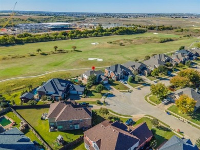 This stunning two-story home is located in the highly on Mansfield National Golf Club in Texas - for sale on GolfHomes.com, golf home, golf lot