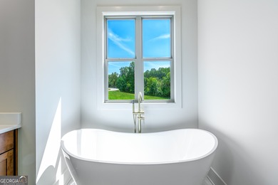 Built by TS Family Homes, this 4BR / 3BA, 3,158-square-foot on Old Union Golf Course in Georgia - for sale on GolfHomes.com, golf home, golf lot