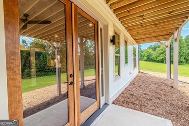 Built by TS Family Homes, this 4BR / 3BA, 3,158-square-foot on Old Union Golf Course in Georgia - for sale on GolfHomes.com, golf home, golf lot