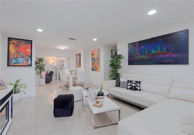 Updated 2BR/2BA home with enclosed patio and a extra  room and on Leisureville Community Association in Florida - for sale on GolfHomes.com, golf home, golf lot