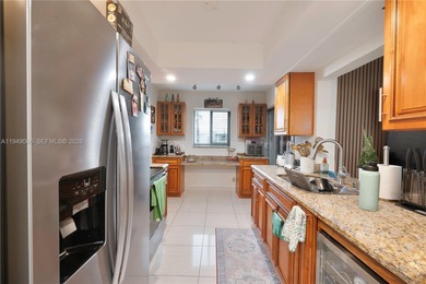 Updated 2BR/2BA home with enclosed patio and a extra  room and on Leisureville Community Association in Florida - for sale on GolfHomes.com, golf home, golf lot