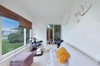 Updated 2BR/2BA home with enclosed patio and a extra  room and on Leisureville Community Association in Florida - for sale on GolfHomes.com, golf home, golf lot