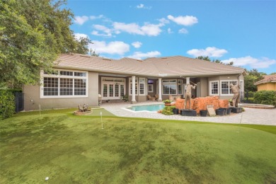 This elegant single-story Rick Watson home, located at 6102 S on The Golden Bear Club At Keenes Pointe in Florida - for sale on GolfHomes.com, golf home, golf lot