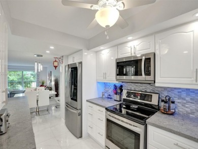 This beautifully renovated 2-bedroom unit is fully furnished and on Inverrary Country Club in Florida - for sale on GolfHomes.com, golf home, golf lot