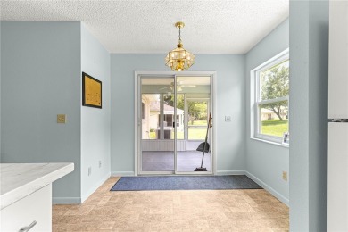 Popular Delphina End Unit Villa located in the Crescent Ridge on On Top of the World Golf Course in Florida - for sale on GolfHomes.com, golf home, golf lot