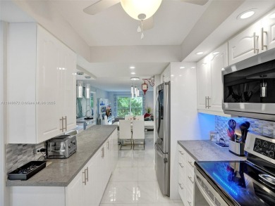 This beautifully renovated 2-bedroom unit is fully furnished and on Inverrary Country Club in Florida - for sale on GolfHomes.com, golf home, golf lot