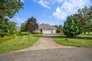 Now available is this beautiful custom-built home located on the on The Medalist Golf Club in Michigan - for sale on GolfHomes.com, golf home, golf lot