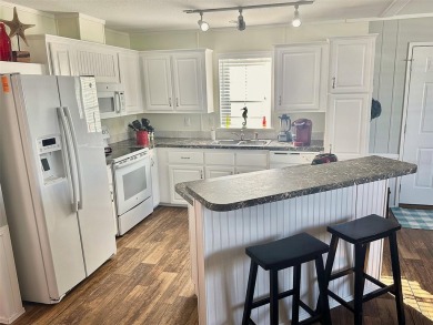 New Super Low Price!! Ready to Move In! Wow! Bonus Golf Cart on Mainlands Golf Club in Florida - for sale on GolfHomes.com, golf home, golf lot