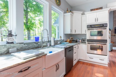 Welcome to this gorgeous home on the water! This, is a on Sound Golf Links at Albemarle Plantation in North Carolina - for sale on GolfHomes.com, golf home, golf lot