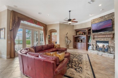This elegant single-story Rick Watson home, located at 6102 S on The Golden Bear Club At Keenes Pointe in Florida - for sale on GolfHomes.com, golf home, golf lot