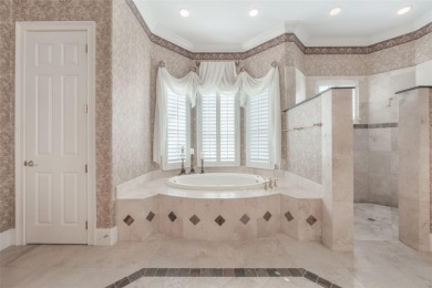 This elegant single-story Rick Watson home, located at 6102 S on The Golden Bear Club At Keenes Pointe in Florida - for sale on GolfHomes.com, golf home, golf lot