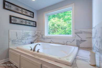 Welcome to this gorgeous home on the water! This, is a on Sound Golf Links at Albemarle Plantation in North Carolina - for sale on GolfHomes.com, golf home, golf lot