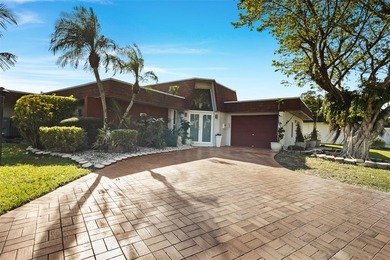 Beautiful 3-bed, 2-bath single-family home with over 2,500 sq ft on Woodlands Country Club in Florida - for sale on GolfHomes.com, golf home, golf lot