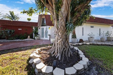 Beautiful 3-bed, 2-bath single-family home with over 2,500 sq ft on Woodlands Country Club in Florida - for sale on GolfHomes.com, golf home, golf lot