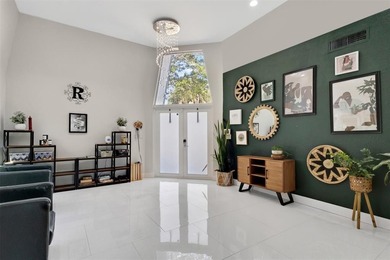 Beautiful 3-bed, 2-bath single-family home with over 2,500 sq ft on Woodlands Country Club in Florida - for sale on GolfHomes.com, golf home, golf lot