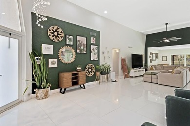 Beautiful 3-bed, 2-bath single-family home with over 2,500 sq ft on Woodlands Country Club in Florida - for sale on GolfHomes.com, golf home, golf lot