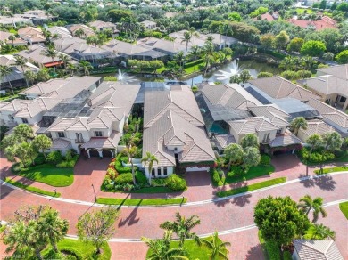Stunning 3 BR, 3.5 BA home situated on a spectacular lakefront on Pelican Marsh Golf Club in Florida - for sale on GolfHomes.com, golf home, golf lot