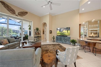 Stunning 3 BR, 3.5 BA home situated on a spectacular lakefront on Pelican Marsh Golf Club in Florida - for sale on GolfHomes.com, golf home, golf lot