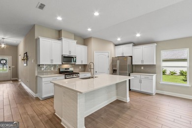 Welcome to 108 Angler Lane, a nearly new five-bedroom on The Club At Osprey Cove in Georgia - for sale on GolfHomes.com, golf home, golf lot