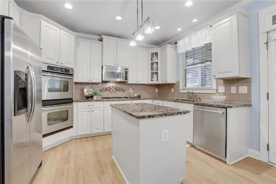 With beautiful curb appeal and tucked on a quiet cul-de-sac in on Windermere Golf Club in Georgia - for sale on GolfHomes.com, golf home, golf lot