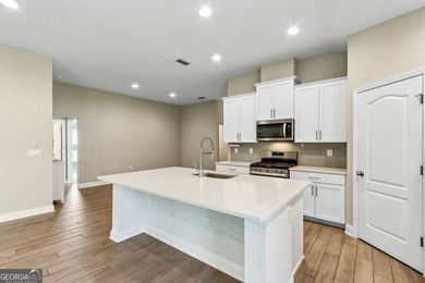 Welcome to 108 Angler Lane, a nearly new five-bedroom on The Club At Osprey Cove in Georgia - for sale on GolfHomes.com, golf home, golf lot