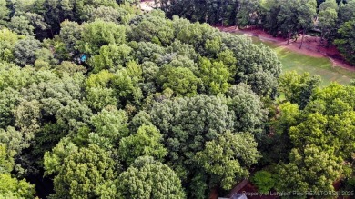 Discover the perfect opportunity to build your dream home on on Carolina Trace Country Club in North Carolina - for sale on GolfHomes.com, golf home, golf lot