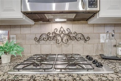 With beautiful curb appeal and tucked on a quiet cul-de-sac in on Windermere Golf Club in Georgia - for sale on GolfHomes.com, golf home, golf lot