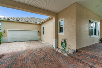 This home is nestled on the 3rd hole of the Pointe West golf on The Club At Pointe West in Florida - for sale on GolfHomes.com, golf home, golf lot