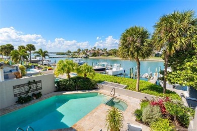 Wonderful corner townhouse w/ exceptional waterfront views! This on Sailfish Point Golf Club, Inc. in Florida - for sale on GolfHomes.com, golf home, golf lot