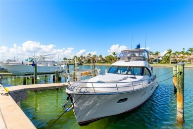 Wonderful corner townhouse w/ exceptional waterfront views! This on Sailfish Point Golf Club, Inc. in Florida - for sale on GolfHomes.com, golf home, golf lot