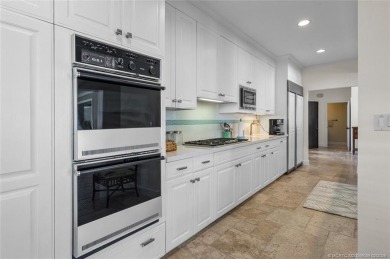 Wonderful corner townhouse w/ exceptional waterfront views! This on Sailfish Point Golf Club, Inc. in Florida - for sale on GolfHomes.com, golf home, golf lot