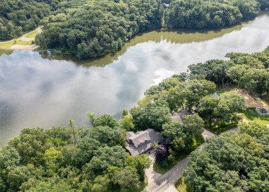 STUNNING TURNKEY CUSTOM-BUILT TIMBER FRAME HOME ON LOST LAKE on Lost Nation Golf Club in Illinois - for sale on GolfHomes.com, golf home, golf lot