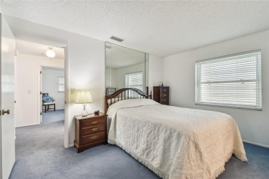 Pride of ownership is evident in this 2-bedroom, 3 full-bath on The Dunedin Country Club in Florida - for sale on GolfHomes.com, golf home, golf lot