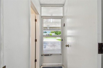 Pride of ownership is evident in this 2-bedroom, 3 full-bath on The Dunedin Country Club in Florida - for sale on GolfHomes.com, golf home, golf lot