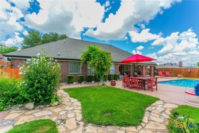 Absolutely stunning inside and out located in beautiful on Hills of Cove Municipal Golf Course in Texas - for sale on GolfHomes.com, golf home, golf lot