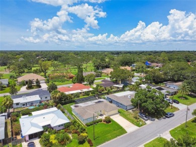 Pride of ownership is evident in this 2-bedroom, 3 full-bath on The Dunedin Country Club in Florida - for sale on GolfHomes.com, golf home, golf lot